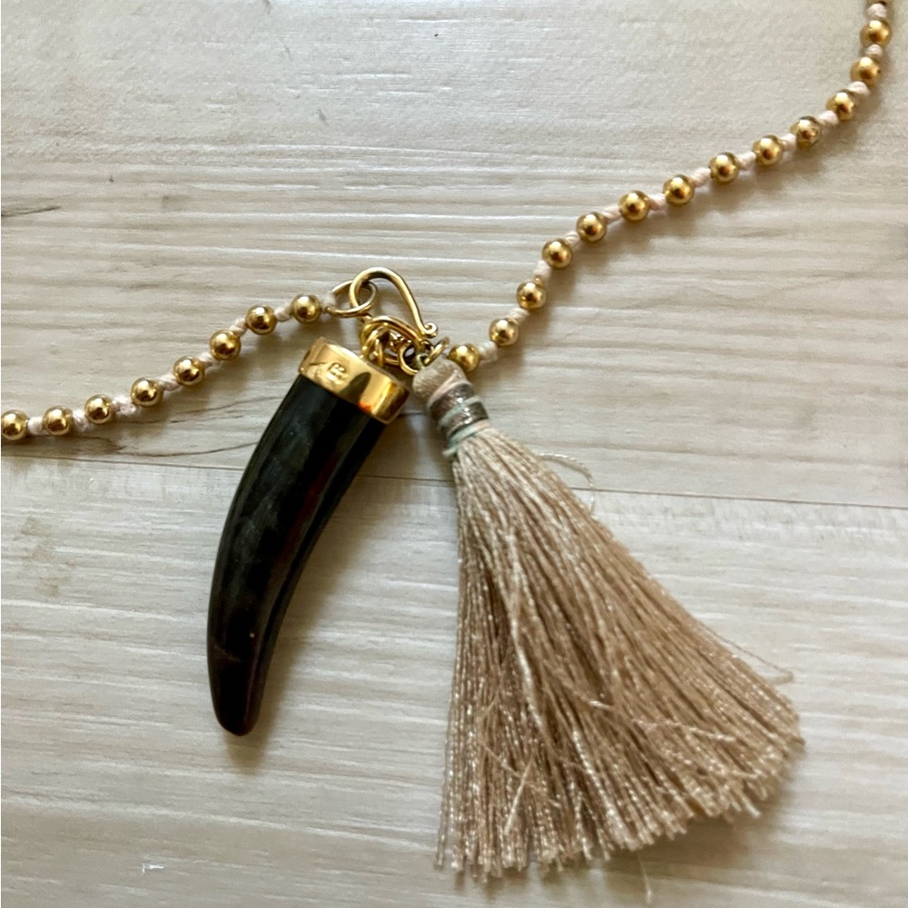 Urban Outfitters Gold and Black Necklace with Tassel